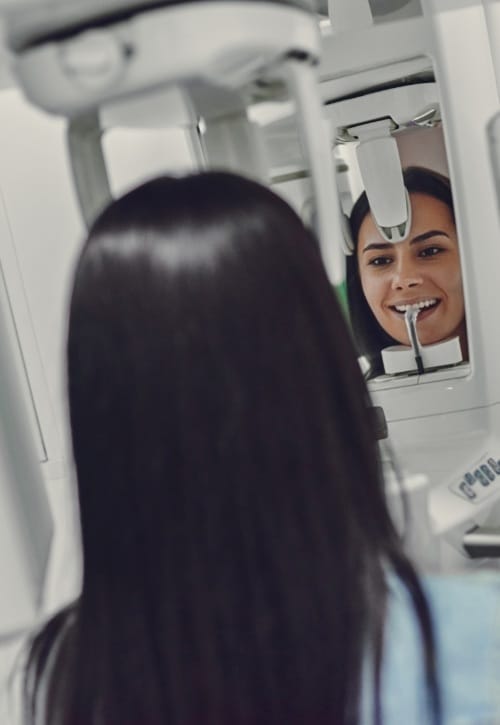 Woman receiving 3 D C T x-ray scan