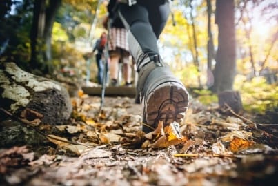 Person running on a trail