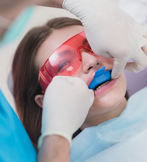 Patient receiving fluoride treatment