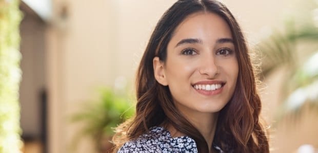 Woman with gorgeous smile after cosmetic dentistry