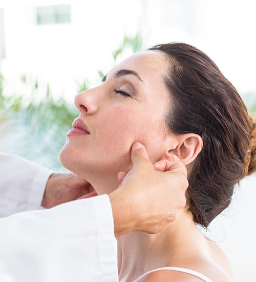 Patient receiving occlusal adjustment from dentist