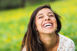 Woman smiling outside